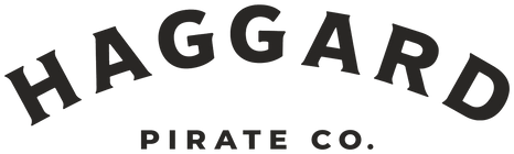 Haggard Pirate Co. arched wordmark in warm charcoal