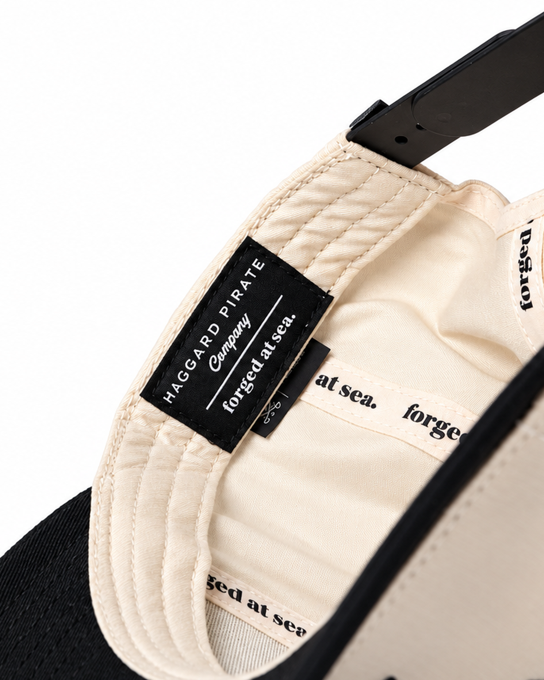 Accurate × Haggard Pirate hat — rear closure and Haggard Pirate woven label detail