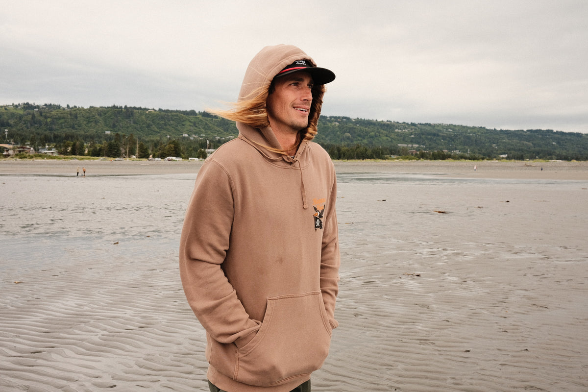Big Beak Midweight Pigment Hoodie - Washed Clay — Alaska trip lifestyle photograph, view 1