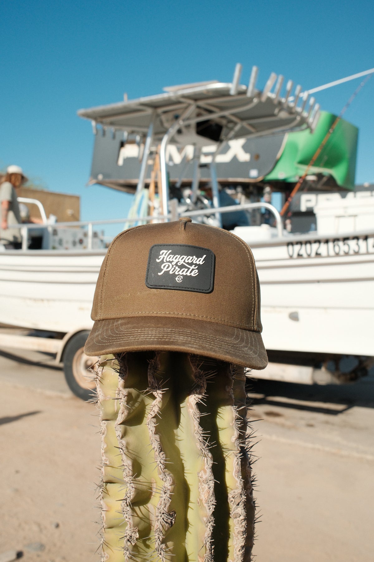Script Snapback photographed in Baja beside the boat